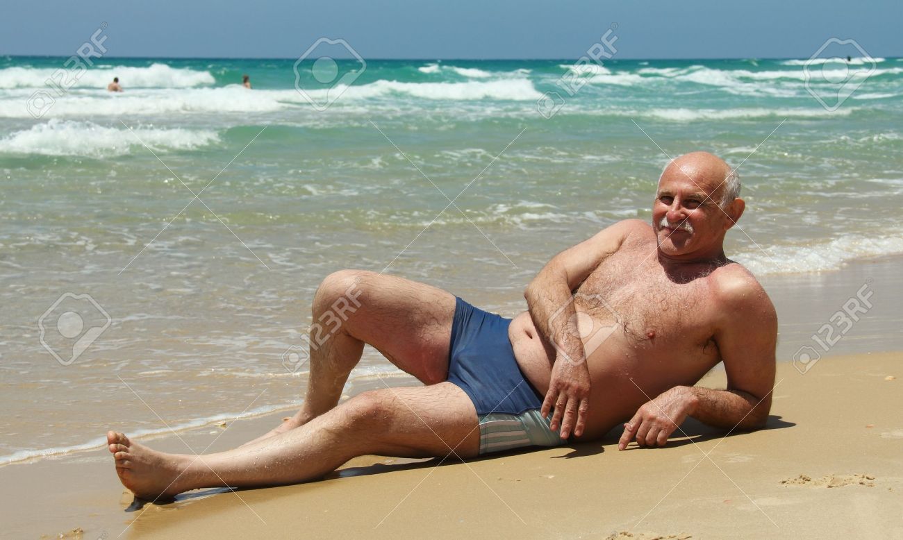 old man on beach.jpeg